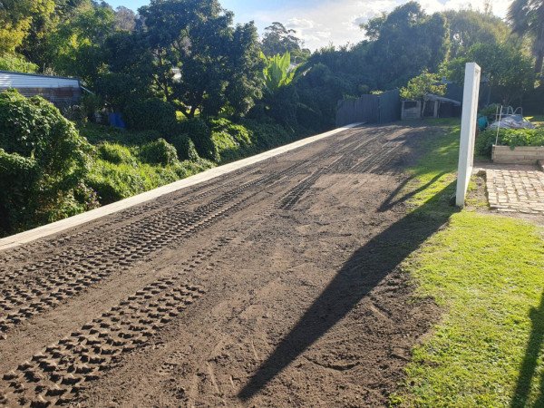 Leveled top soil and seeding