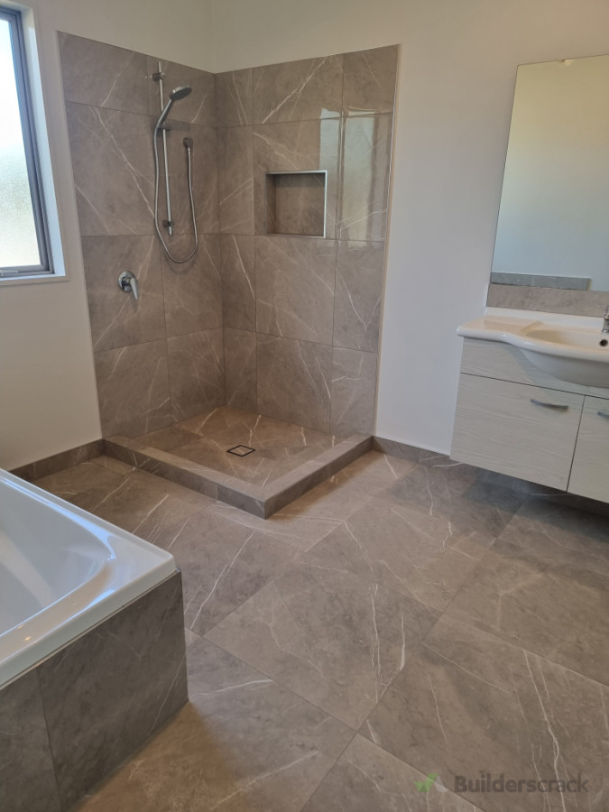 Bathroom  floor and shower wall tiling