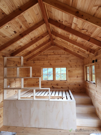 Bed with bookshelve and storage underneath