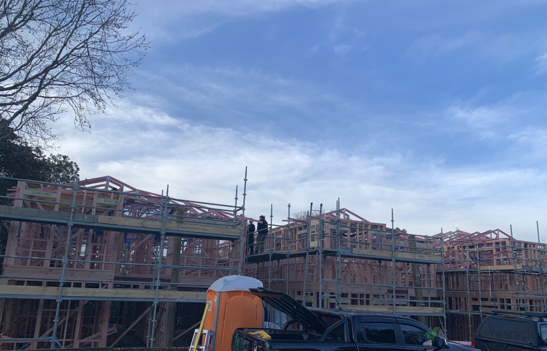 Framing being carried out for 3 houses at New Lynn