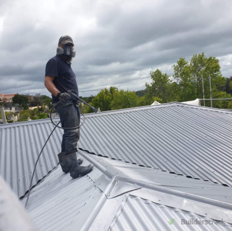 Applying Primer to steel roof