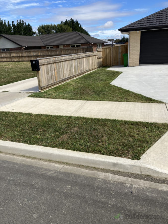 Front Lawn, left side of driveway