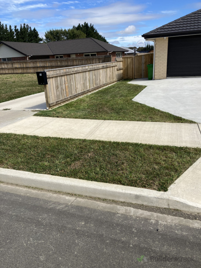 Front Lawn, left side of driveway