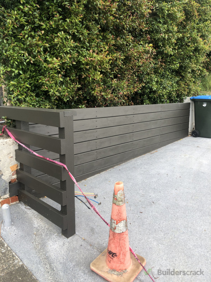 Retaining wall, fence and slab for a happy customer