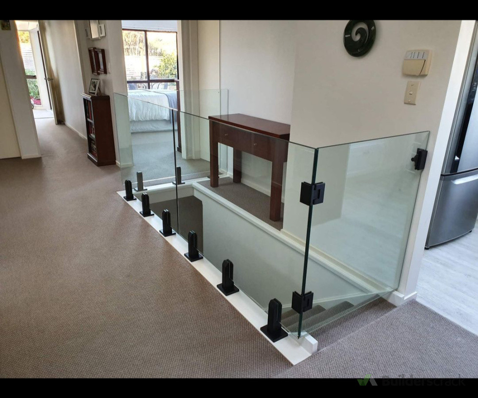 Internal frameless balustrade with gate fitted