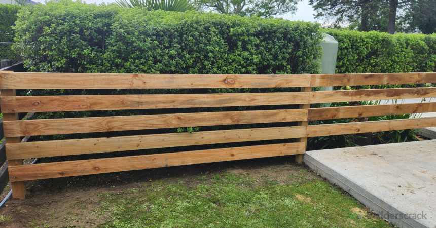 Post and rail to keep dog out of garden