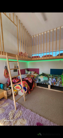 Kids bedroom with mezzanine floor and built in beds