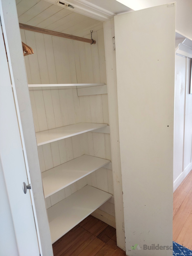 Hallway cupboard- new shelving added