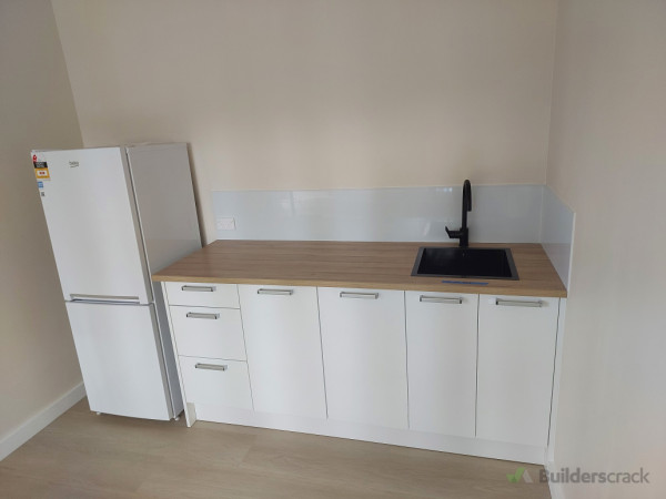 New kitchenette installed,  flooring. Splashback.