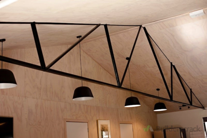 Whitewash ply ceiling and exposed truss
