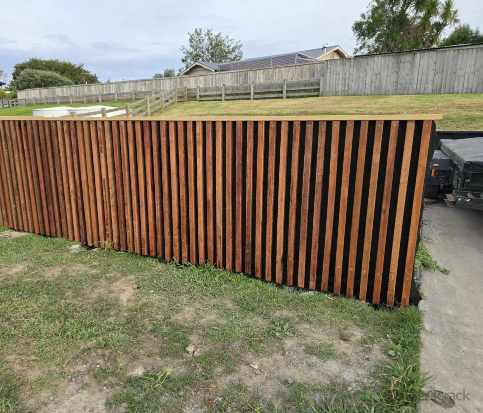 Decorative fence to cover water tanks