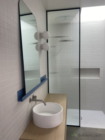 Shower screen and custom mirror.
