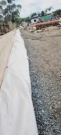 Installation of cloth before backfilling