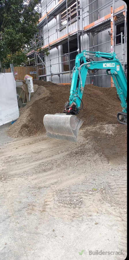 Final trimming of soil for final level