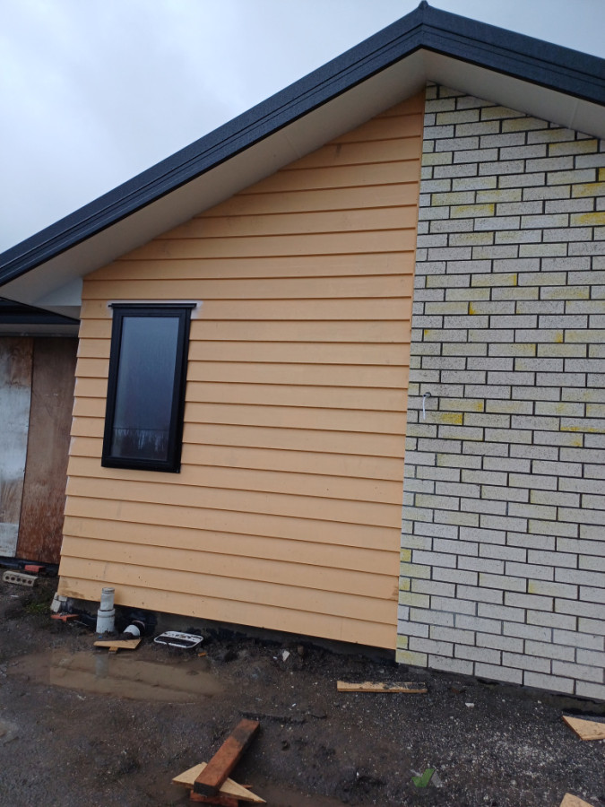 Cladding installation at our new build in Halswell