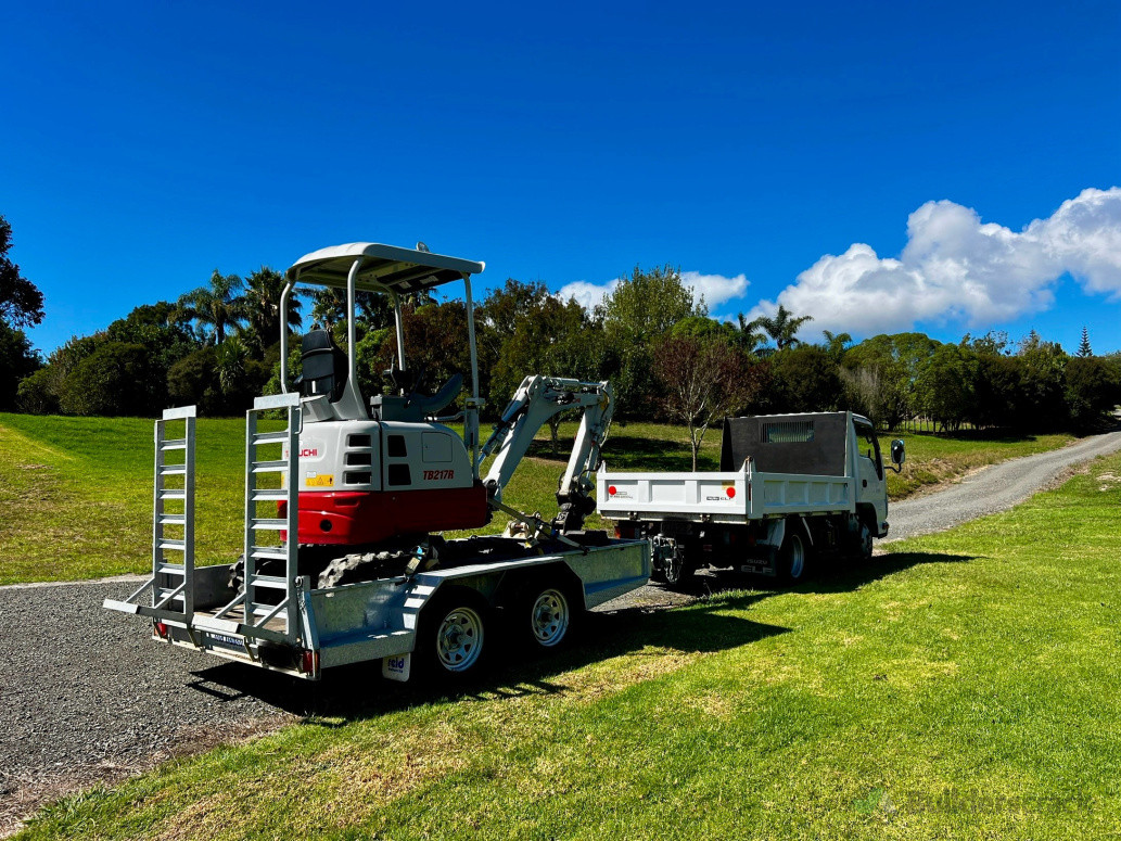 Modern 1.7 ton excavator and 3 ton tip truck for getting the job done