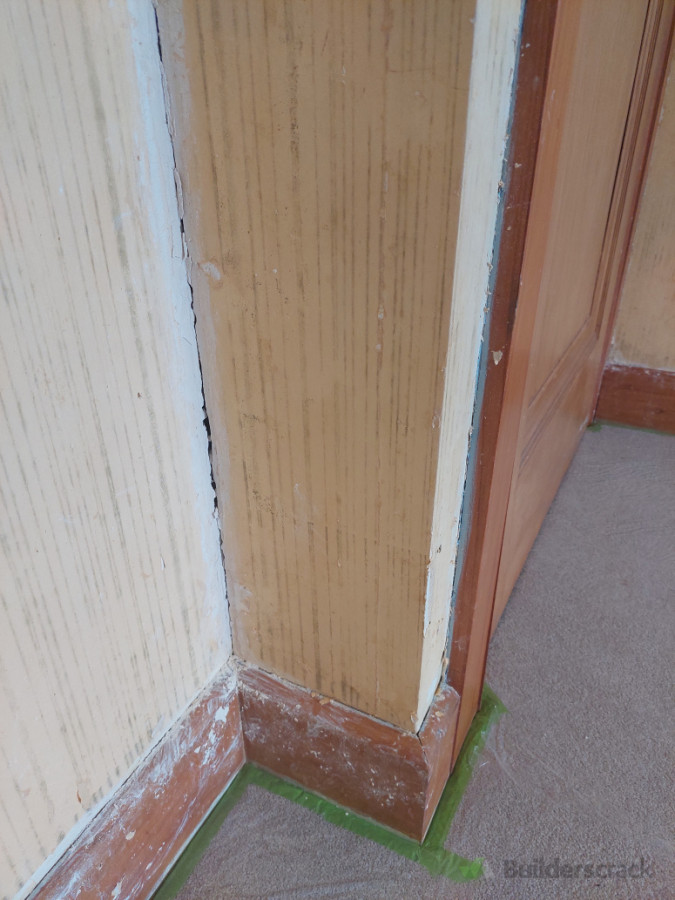 A close up of the walls and trims after the removal of wall paper
