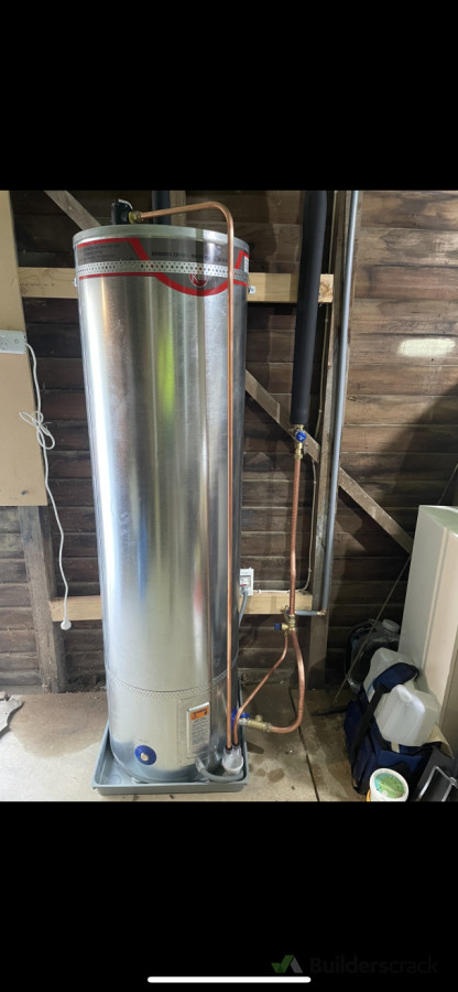 Mains pressure hot water cylinder installation under house.