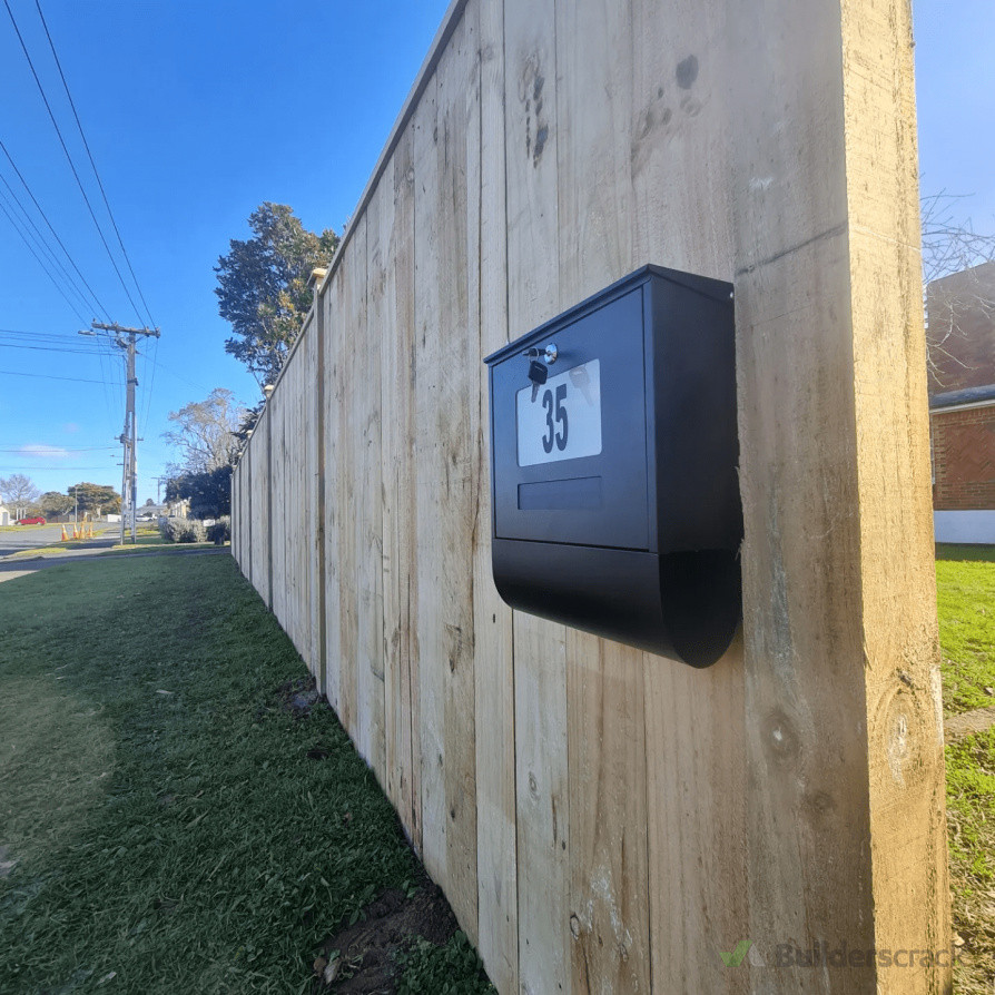 Capped timber fence with mailbox (80m)