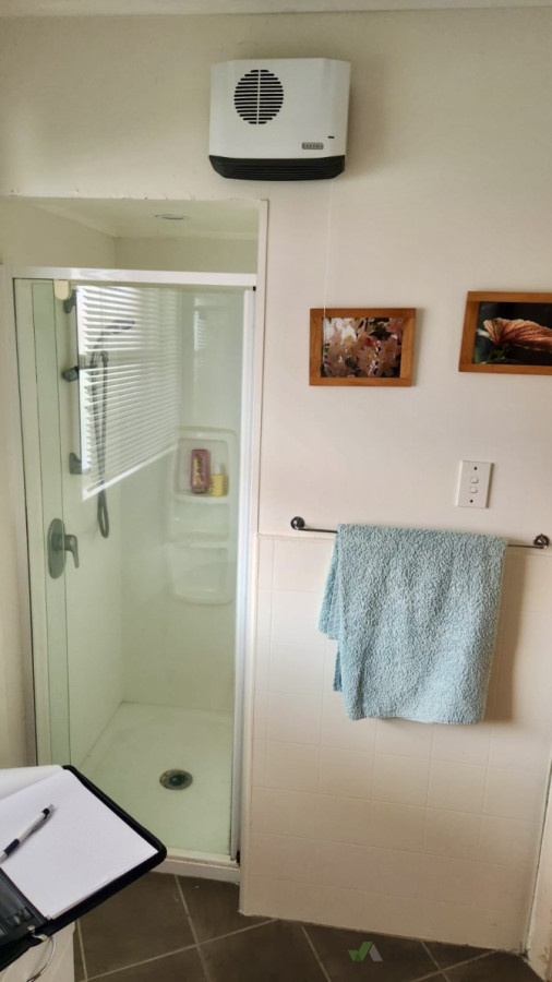 Before - Boxed in shower and laundry cupboard