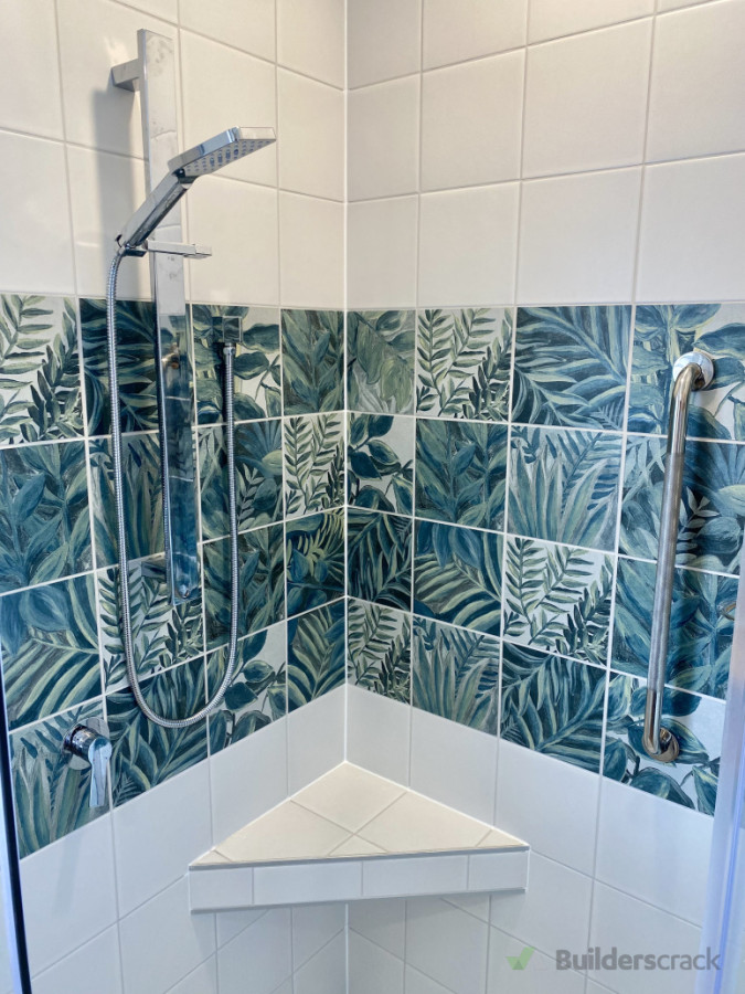 Grab rail and tiled seat for comfort