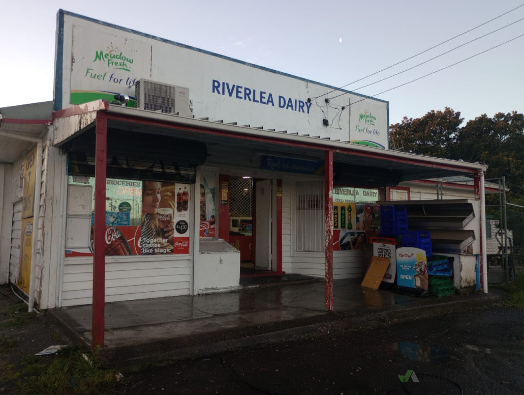 Before, a tired looking shop