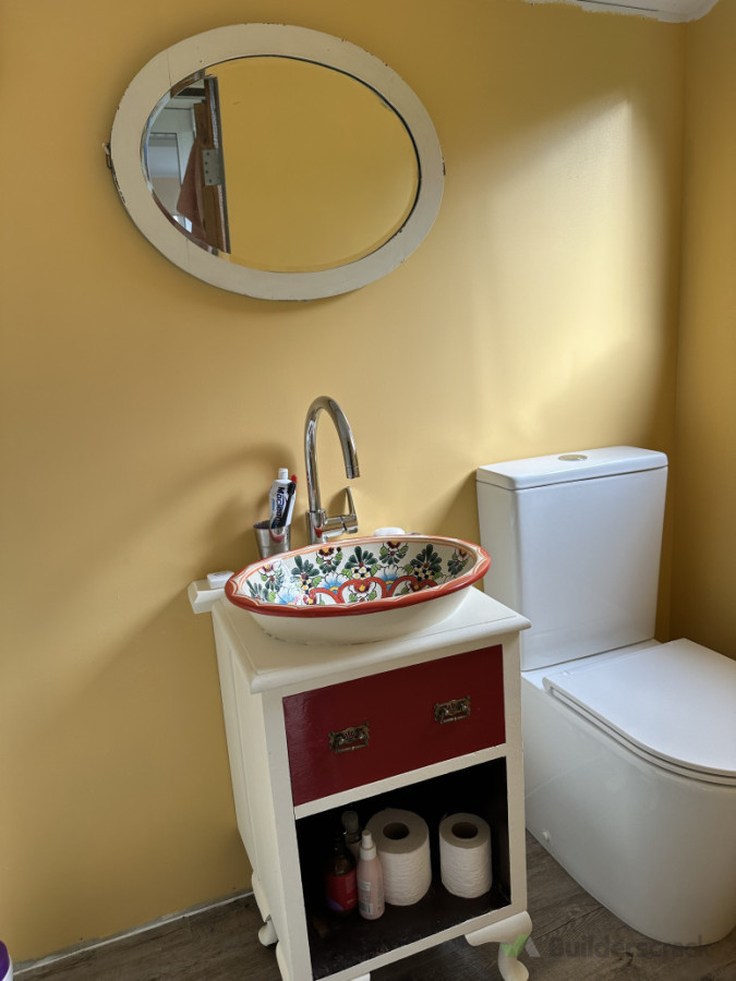 new toilet and custom vanity