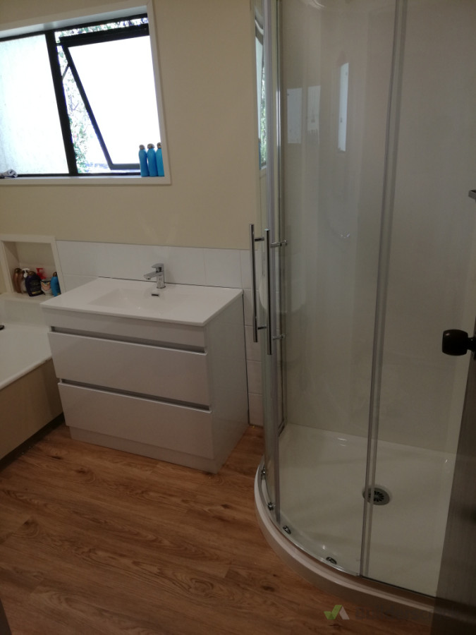 Shower, vanity, vinyl flooring installation