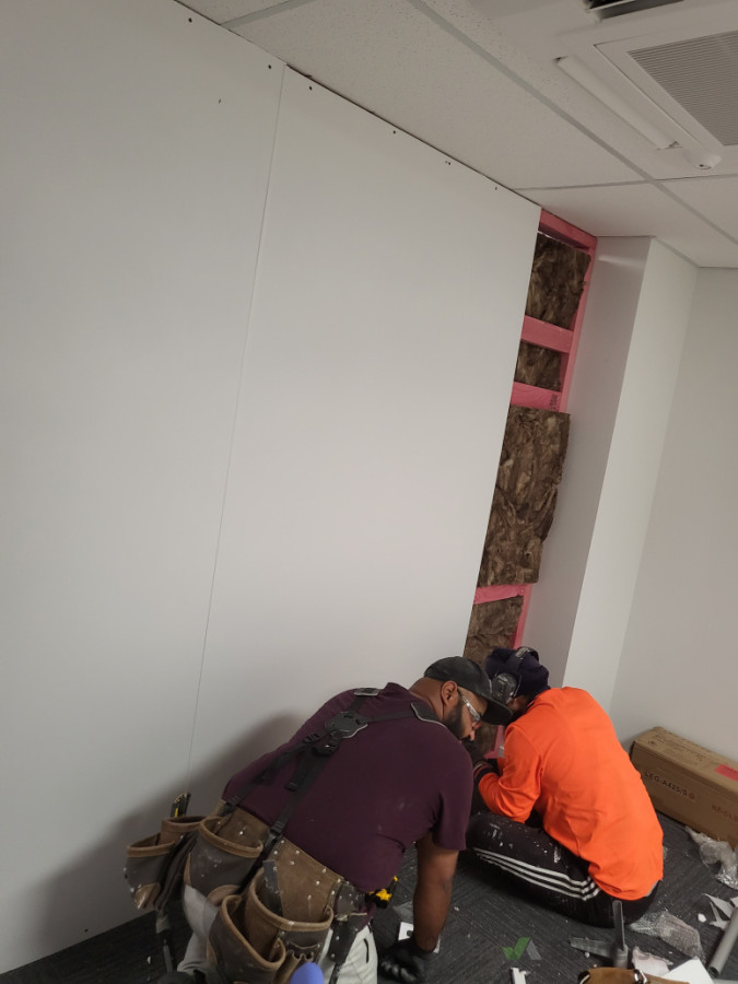 Installation of insulation and plasterboards