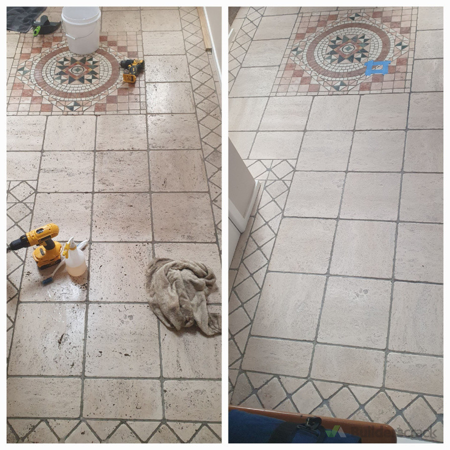 Clean and repairs to stone floor including loose tile re fixing and resin infill of divots in stone tiles.
