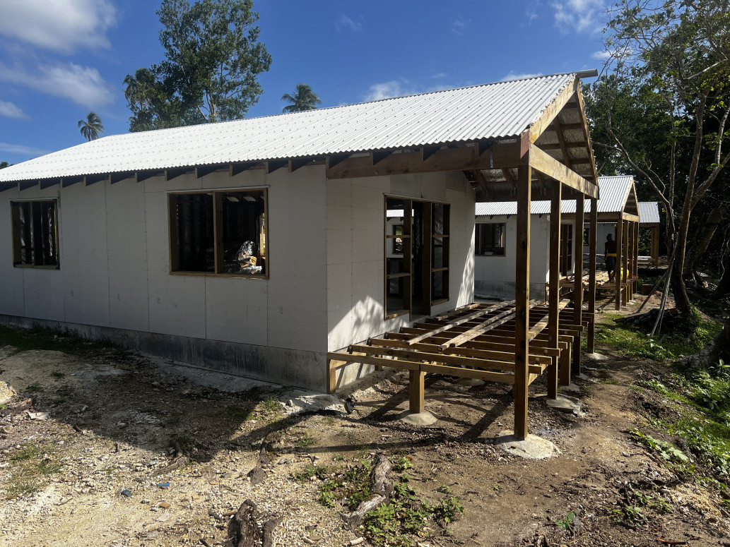 a partly finished bungalow with fibre cement cladding