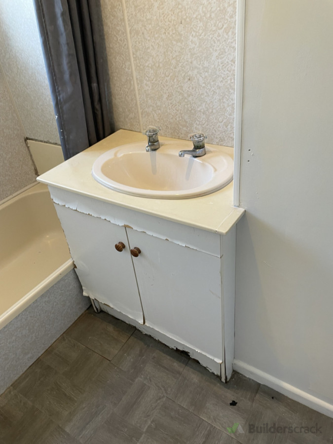 New vanity and flooring installation - before