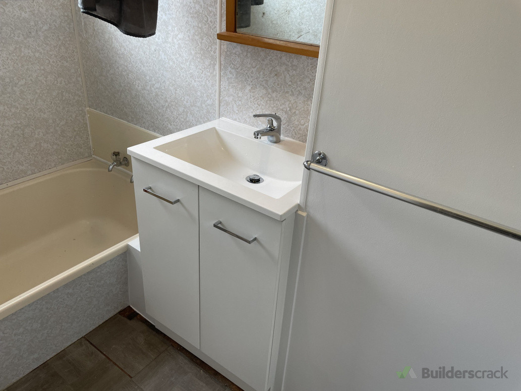 New vanity and flooring installation completed
