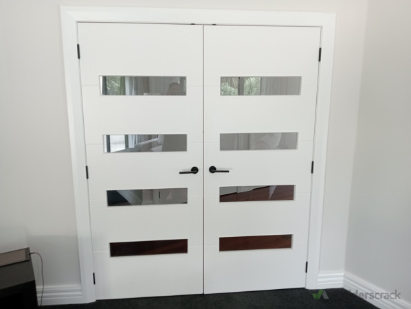 New doors, installed hardware, new architraves and skirting