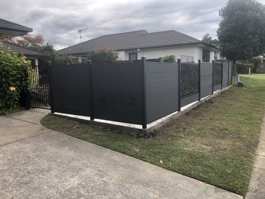 Composite fence with decorative panels