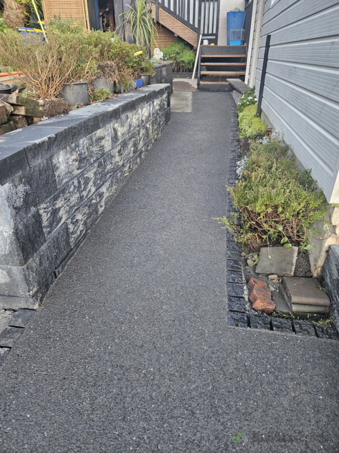 Exposed aggregate and keystone wall