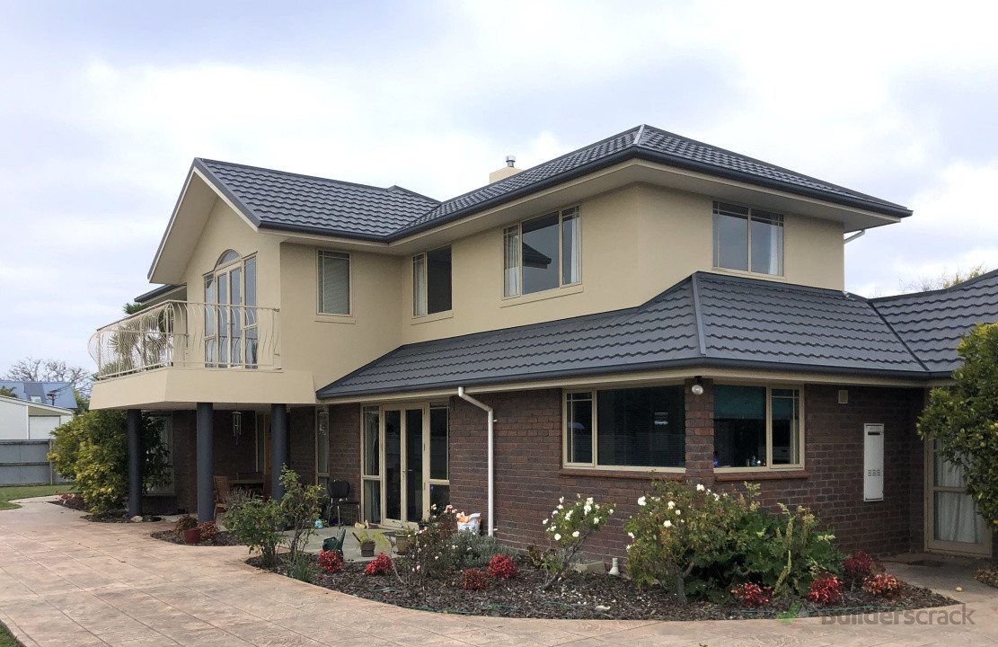 Repainting your home's exterior keeps it weather-tight and increases value