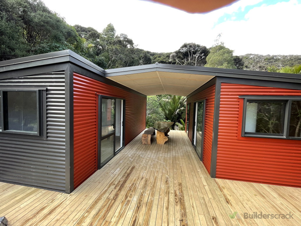 2 cabins with a wrap around pine deck -70m2