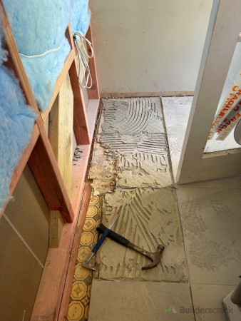 Remove tiles and damaged flooring