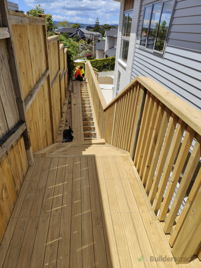make a wide garden access stair to a decking look on the block retaining wall