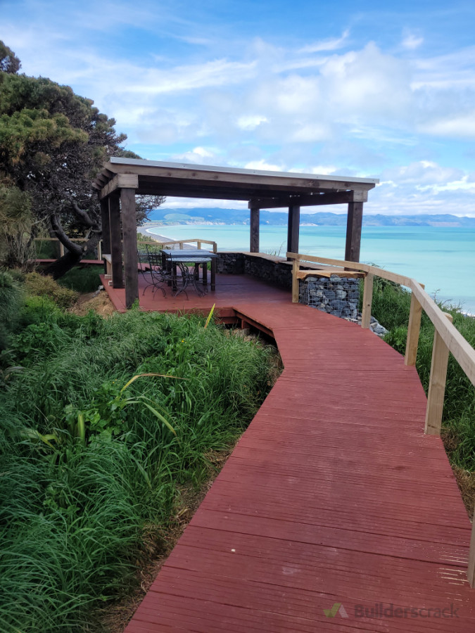 Pine boardwalk with handrail