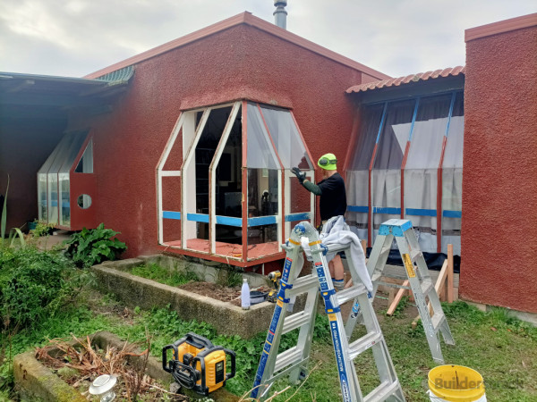 During - lounge corner bay window being removed