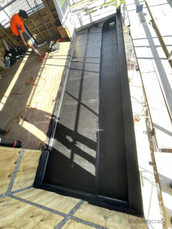 Base sheet installation to plywood substrate