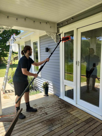 jamie cleaning exterior windows