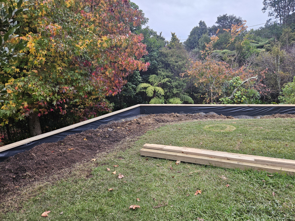 Retaining wall to then level out this backyard