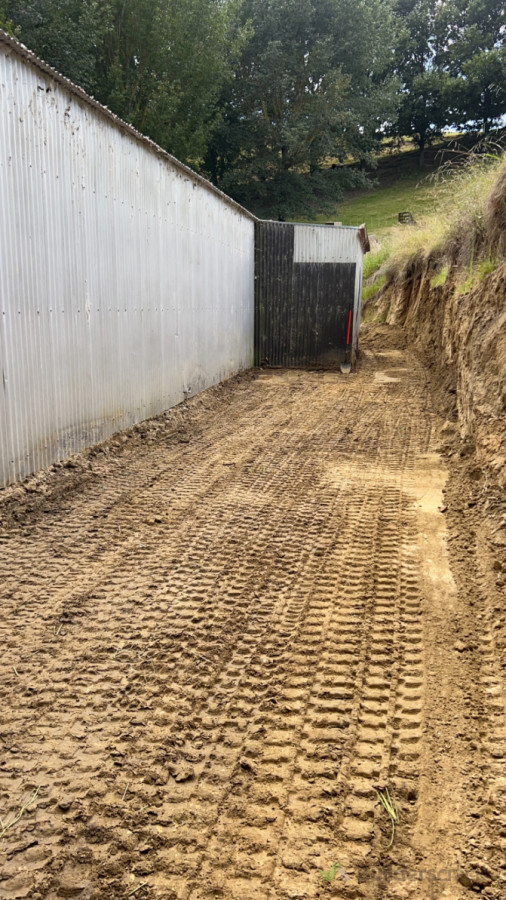 Here we excavated soil away from a farm shed after the hill slipped down