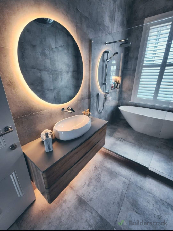 A modern bathroom with custom lighting