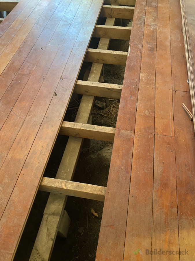 I made a special tool that drive the nails into the joists and the floorboards pop up to avoid damage and excavation costs. Full repile in Seatoun a house from the beach.