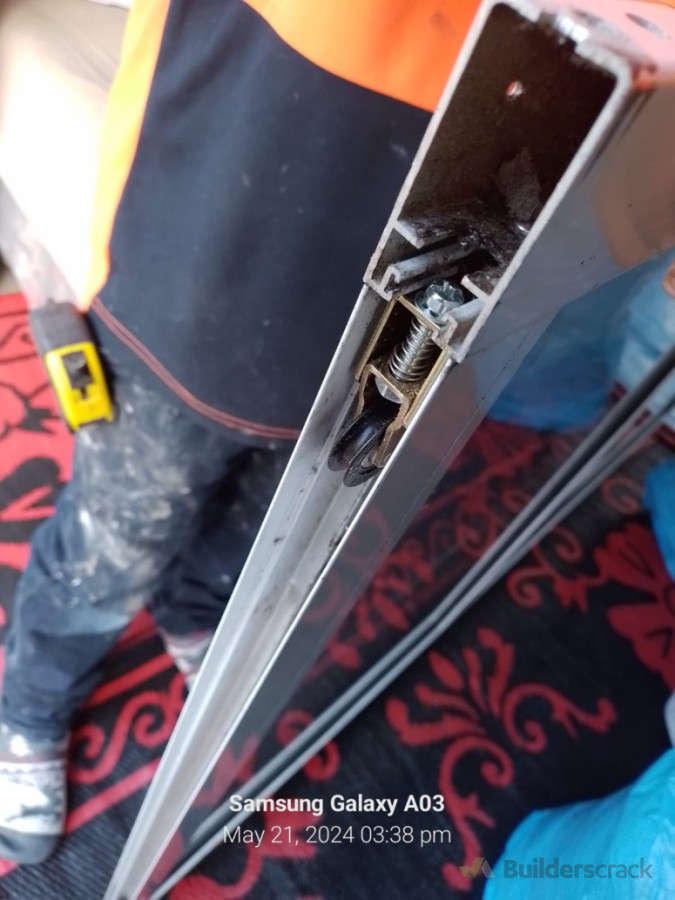 Aluminium sliding door roller replaced