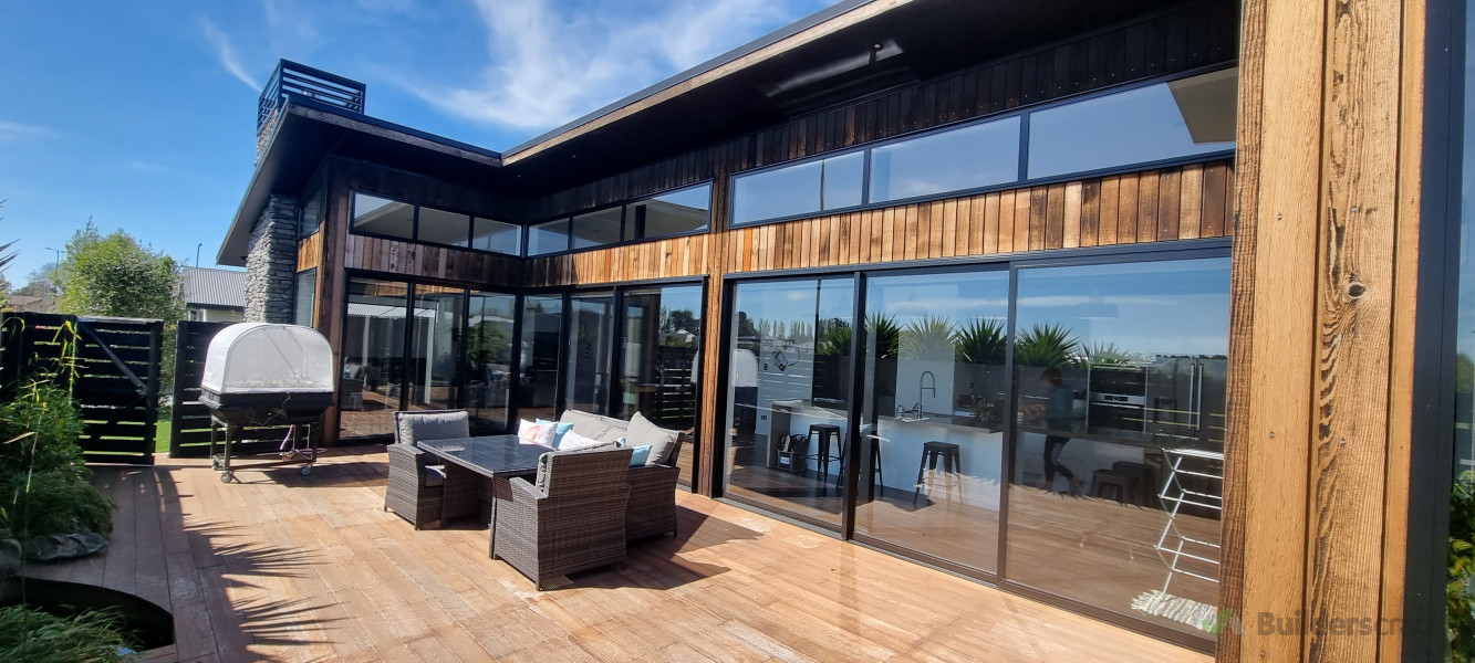 Extremely weathered cedar cladding we washed by hand